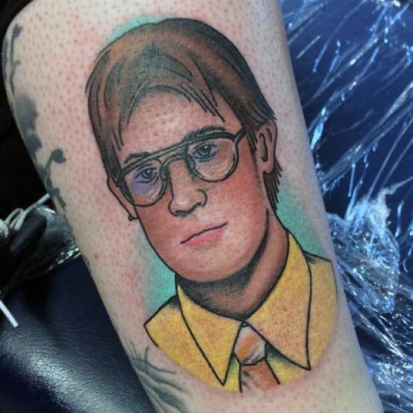 Color tattoo of Jim Halpert dressed as Dwight Schrute from *The Office*, referencing the hilarious "Identity Theft is Not a Joke" prank.