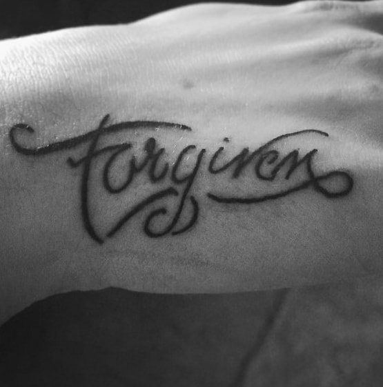 Side Of Hand Mens Forgiven Cursive Tattoos