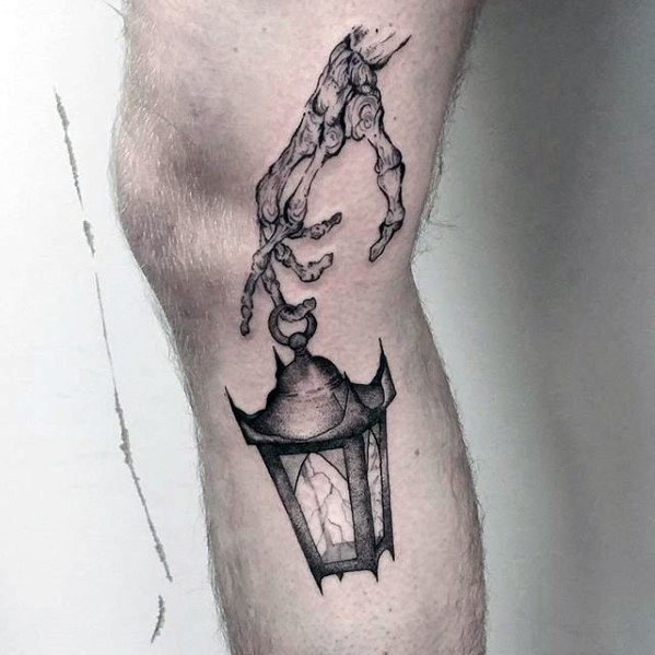 Side Of Leg Skeleton Hands With Lantern Tattoo Designs For Guys