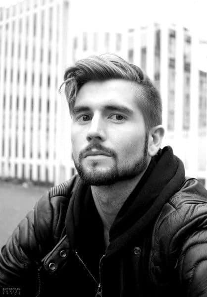 Side-swept undercut with a textured top and a clean fade