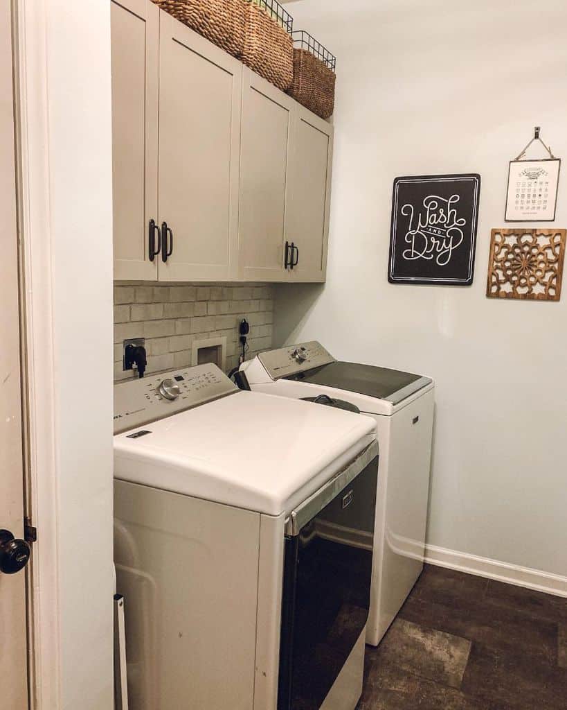 small simple laundry with washer and dryer