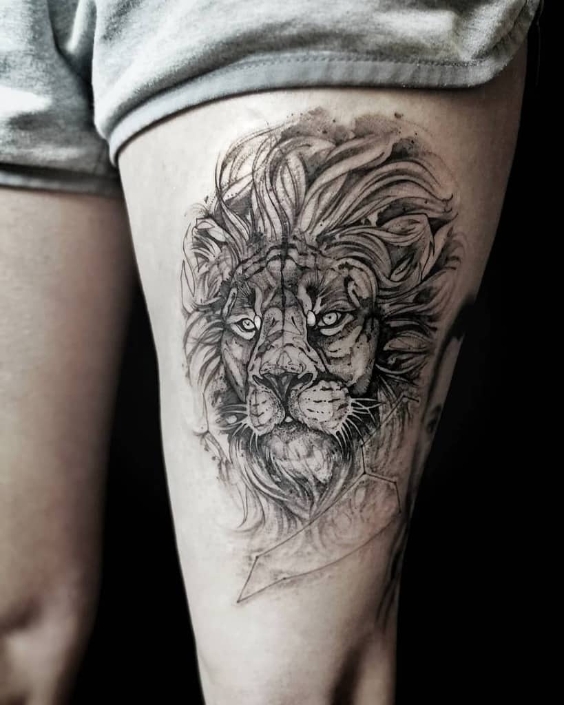 Realistic black and gray lion tattoo on the thigh, featuring intense eyes and a flowing mane.