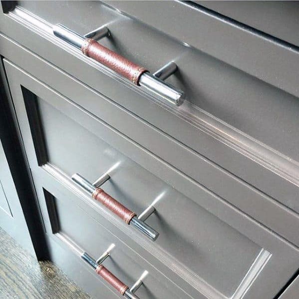 silver metal handles with leather cozy trim
