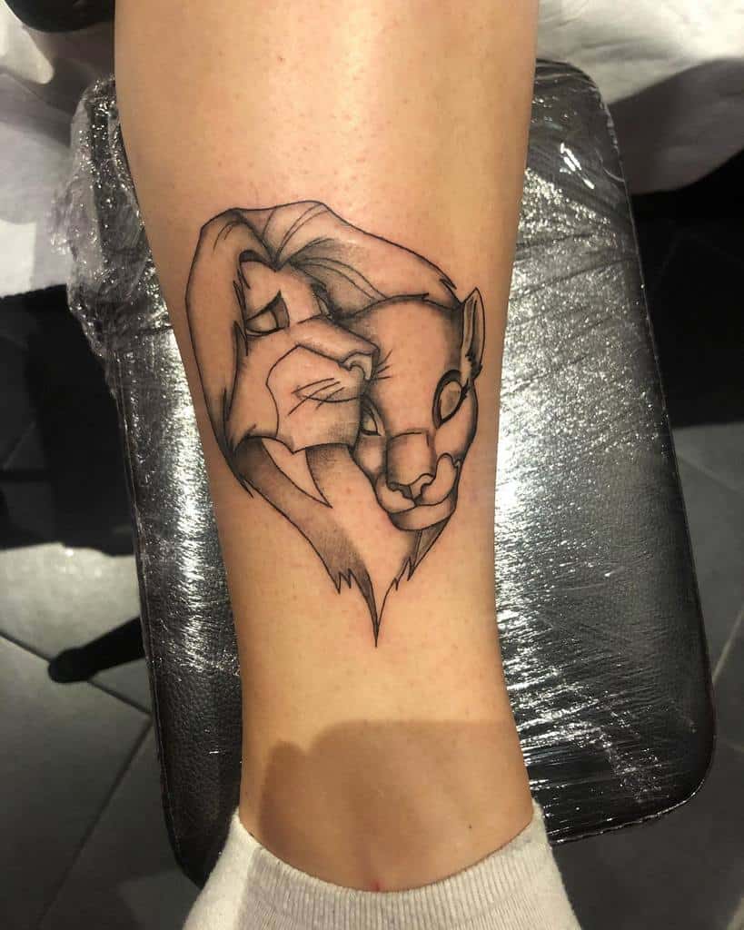 Line art tattoo depicting Nala and Simba cuddling