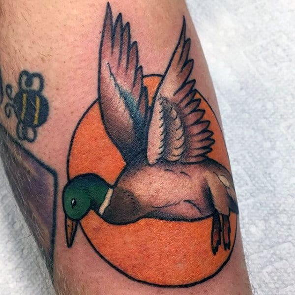 Simple American Traditional Duck Flying Over Sun Tattoo For Males