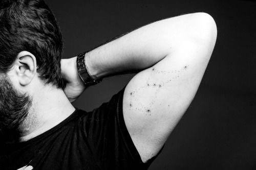 Simple Bicep Male Constillations Tattoo Design
