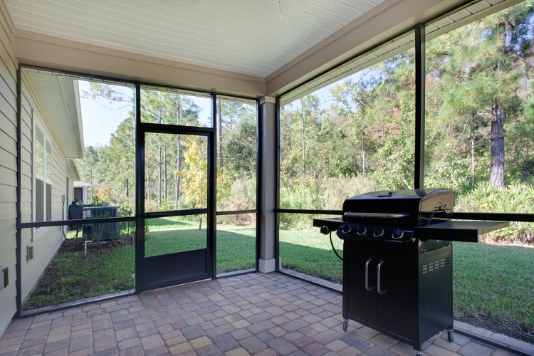 screened outdoor BBQ area
