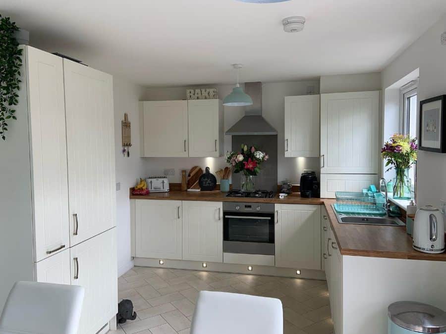 simple white cabinet kitchen with led lights subway floor tiles