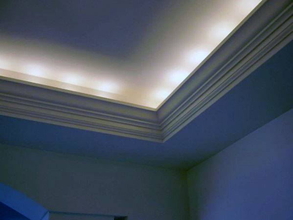 Minimalistic design with soft crown molding lighting, creating a calm and serene ambiance