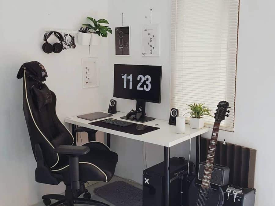 simple desk setup gaming chair electric guitar