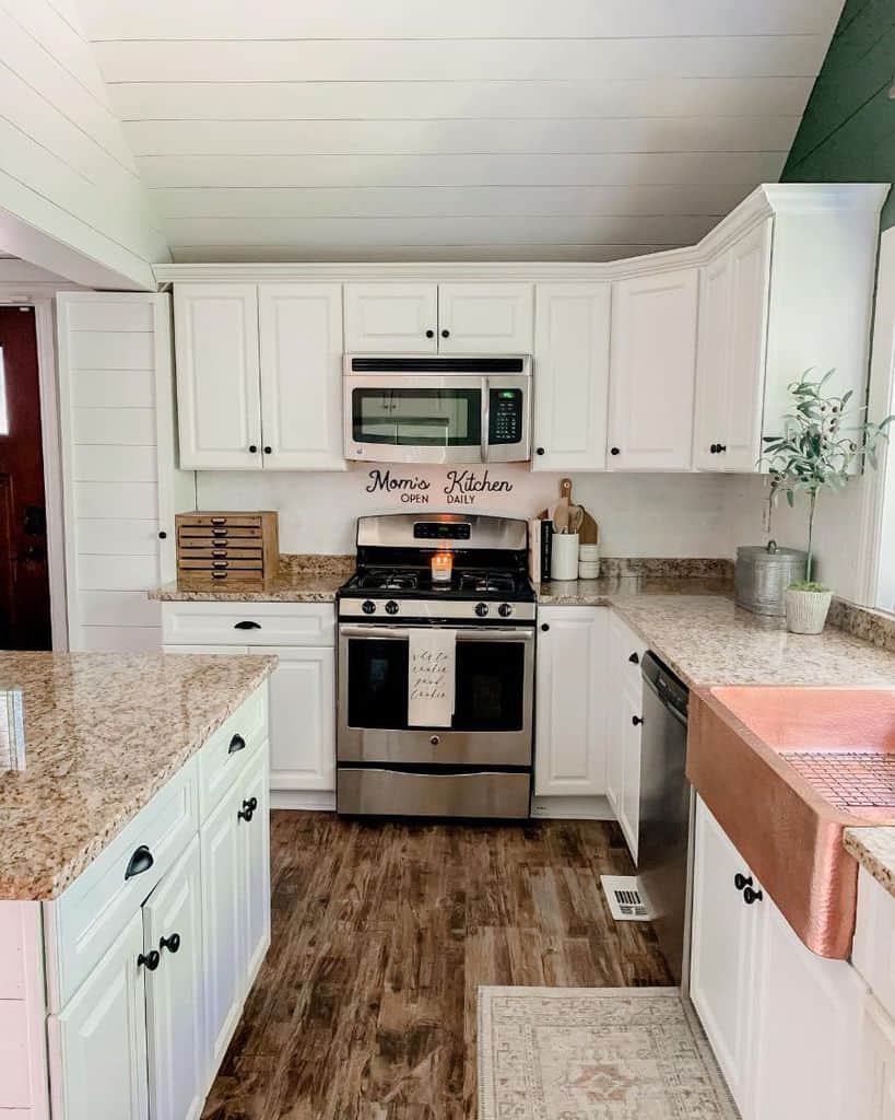 simple farmhouse kitchen white cabinets wood floor granite countertops