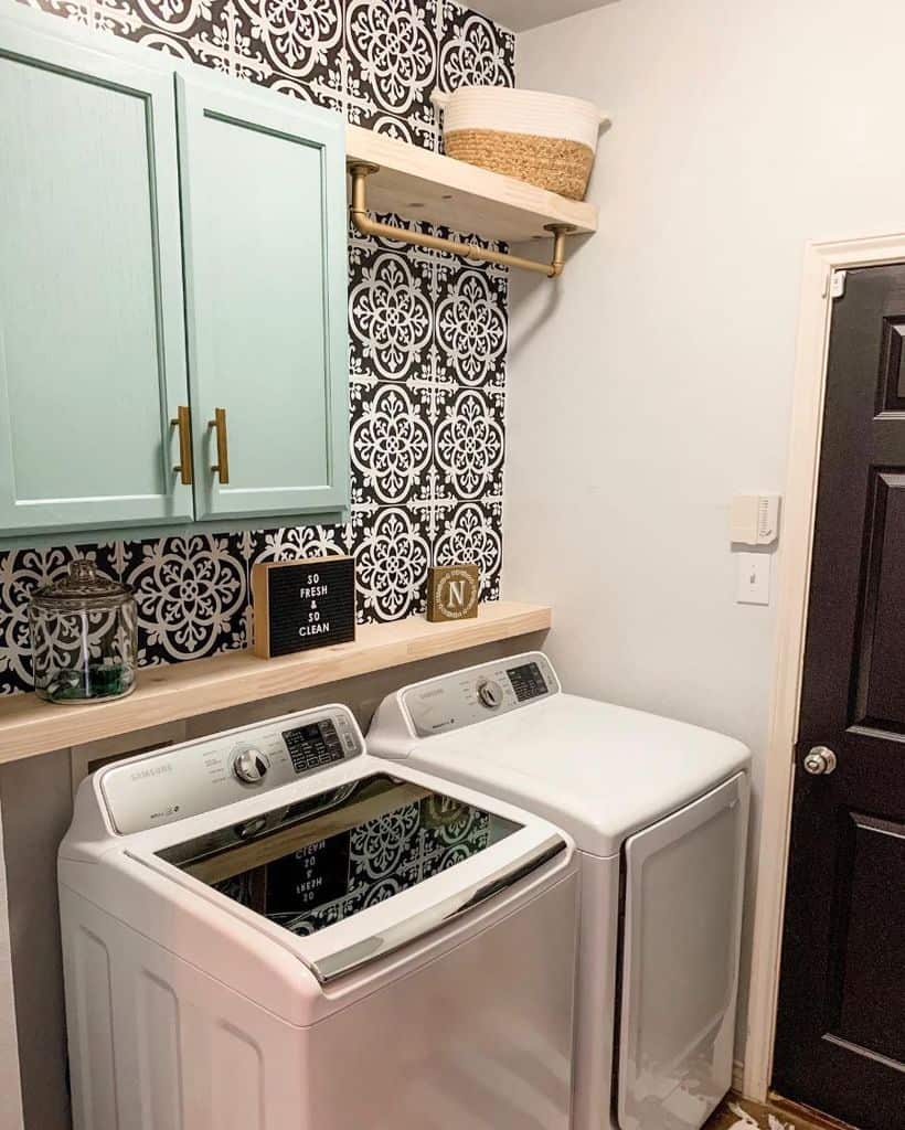 green wall cabinet laundry washer and dryer tile pattern wall