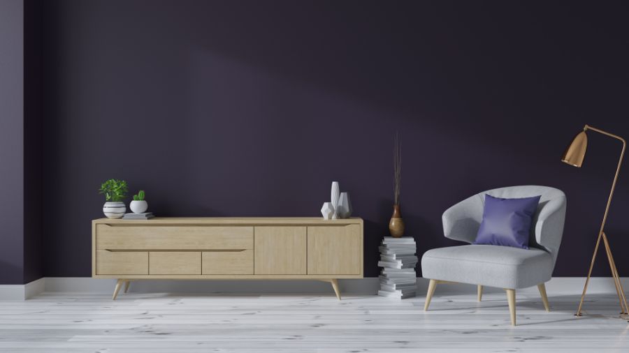 minimalist modern living room with gray accent chair 