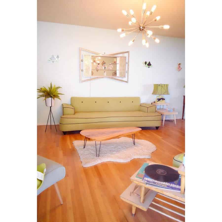 vintage style living room with sofa and sputnik chandelier