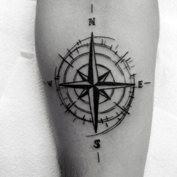 Simple Nautical Star Compass Travel Leg Tattoo On Gentleman With Black Ink
