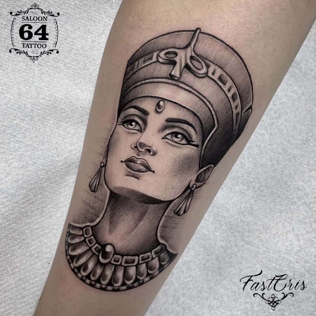 Realistic Nefertiti tattoo with intricate shading and detail, capturing her regal beauty and iconic features
