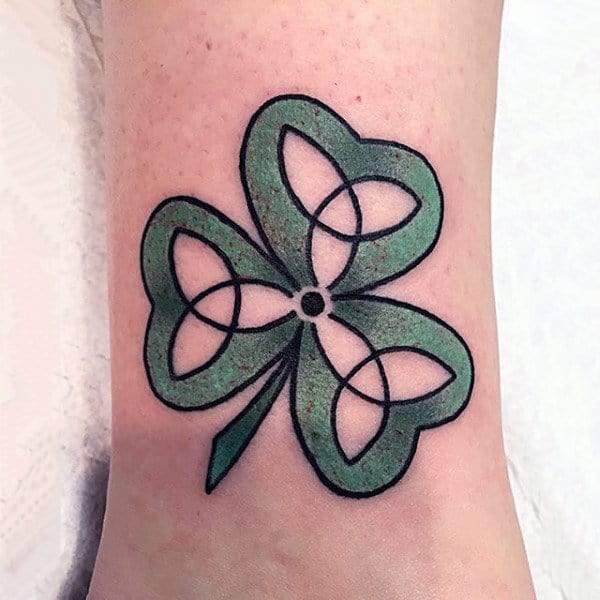 Simple Negative Space Shamrock Wrist Tattoos For Guys