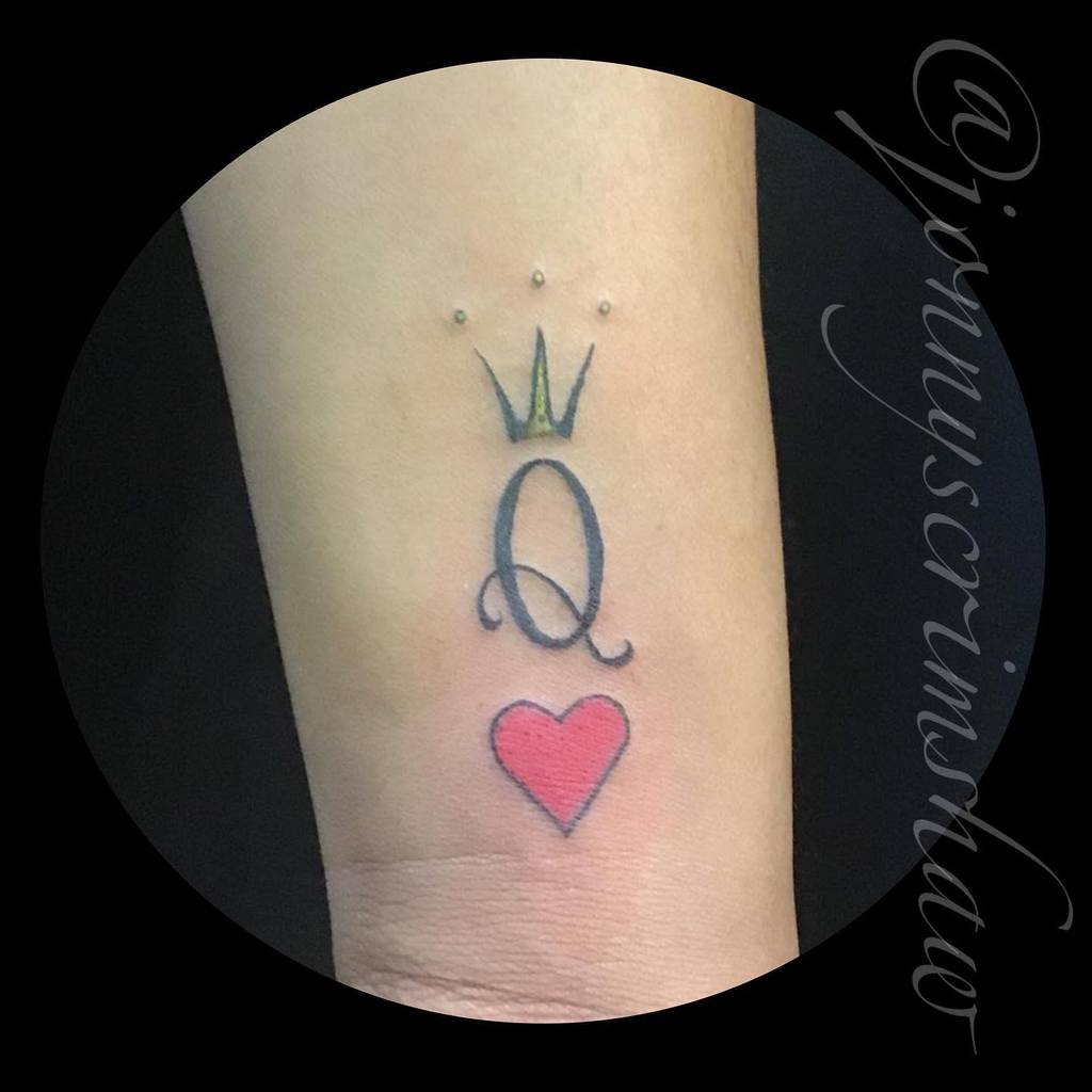 Simple queen of hearts tattoo