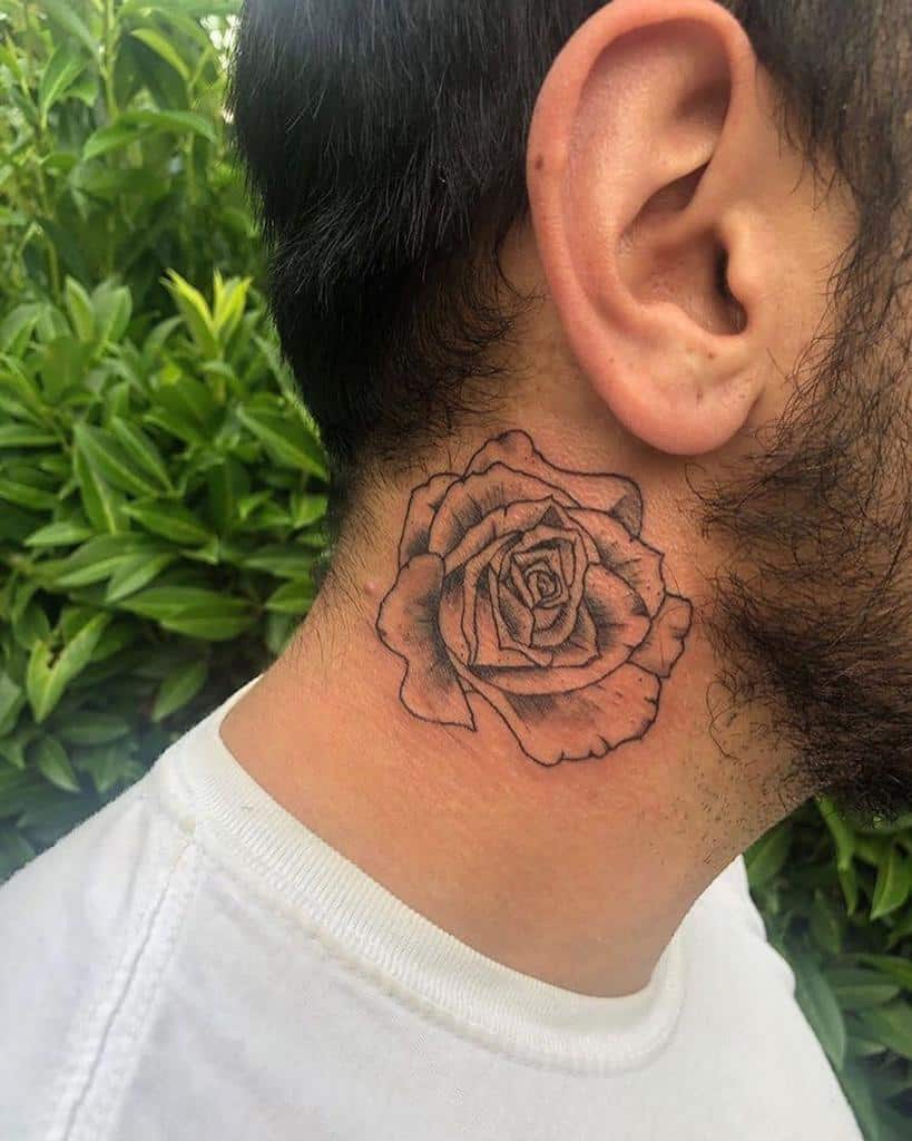 A neck tattoo of a black-ink rose