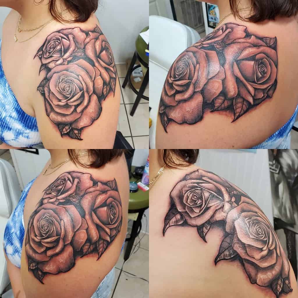 The shoulder tattoo features a stunning black and gray rose