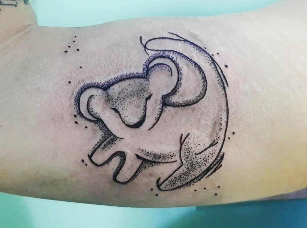 Line art tattoo of a Simba as a lion cub, with dotwork shading