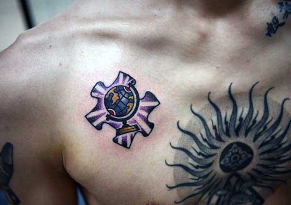 Simple Small Mens Puzzle Piece Globe Tattoo On Chest