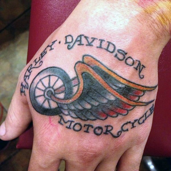 Simple Traditional Harley Davidson Wheel With Wings Male Tattoos