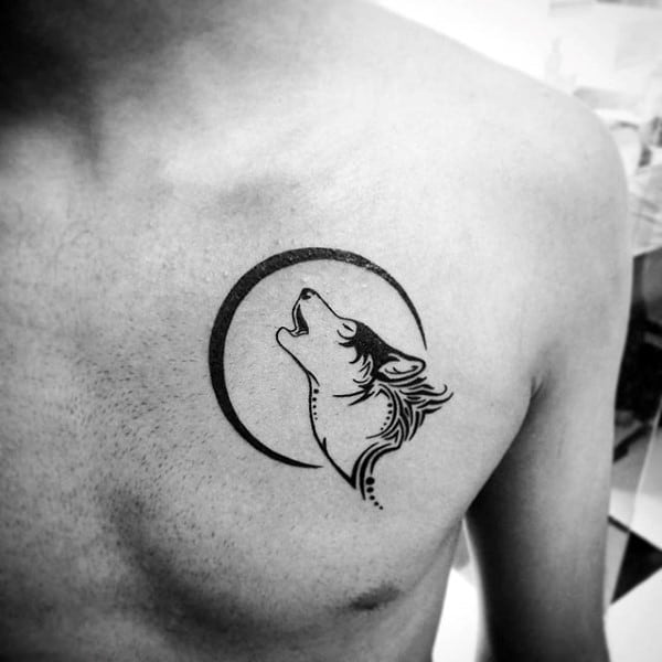 Simple Tribal Wolf Moon Male Chest Tattoo Inspiration
