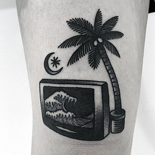 Tattoo featuring a palm tree, crescent moon, star, and a TV displaying waves