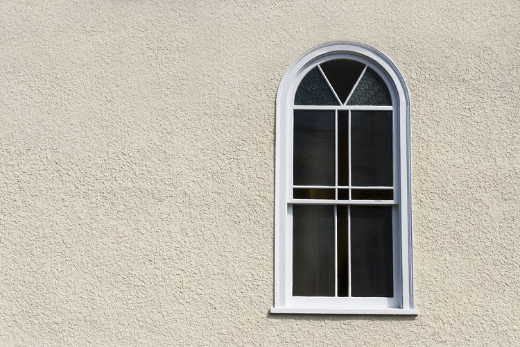 simple white stucco exterior window trim