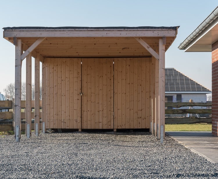 simple wooden carport gravel 