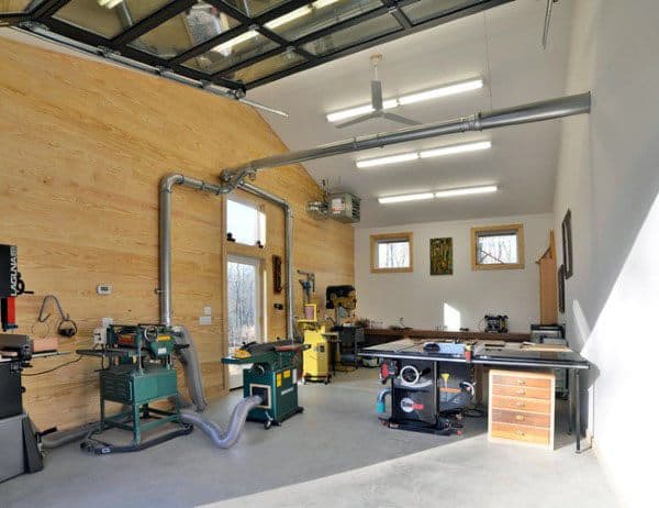 white wall wood panel workshop wood workbench dust collecting system