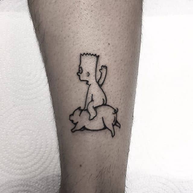 A black ink tattoo of a cartoon boy riding a pig, drawn in a minimalist and humorous style, placed on the lower leg.