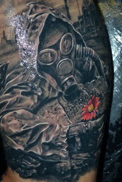 Single Color Flower Gas Mask Tattoo For Men On Bicep