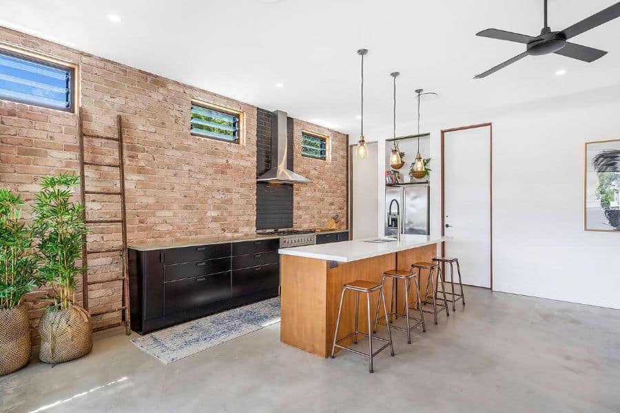 minimalist kitchen with brick wallpaper feature wall