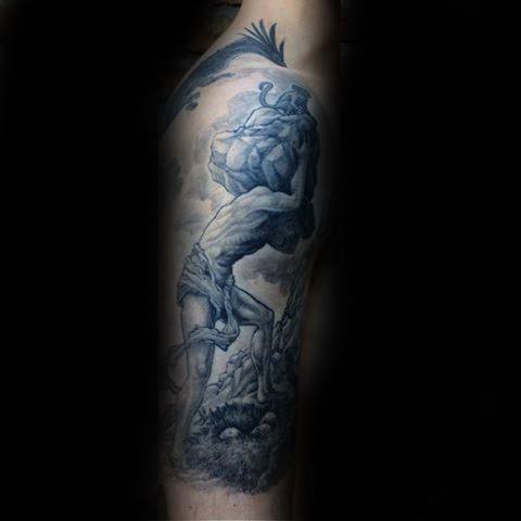 Dark and dramatic Sisyphus tattoo on the arm, showing a muscular figure straining under a boulder with moody clouds and shadows.