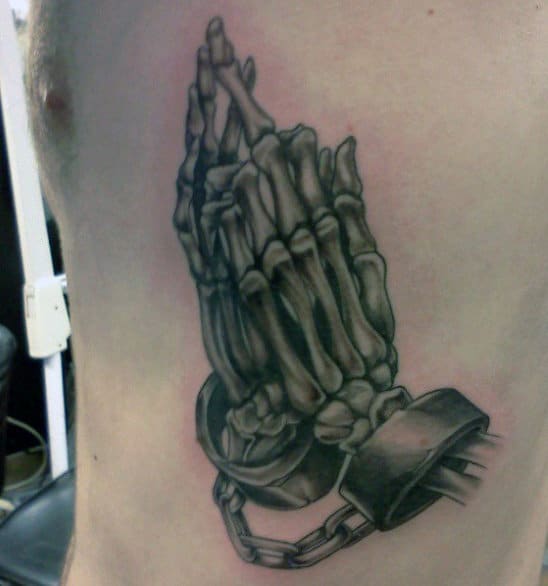 Skeleton Hands Praying Guys Chain Tattoos On Arm