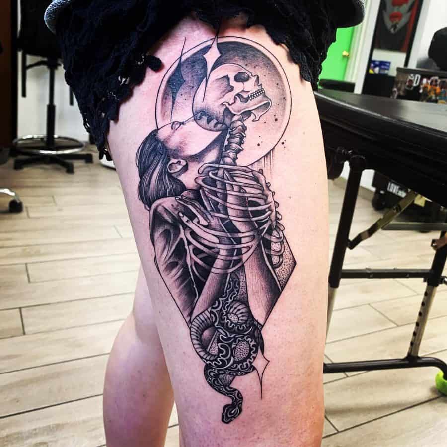 Thigh tattoo featuring a surreal skeletal woman merging with a skull and moon, blending gothic, geometric, and symbolic elements.