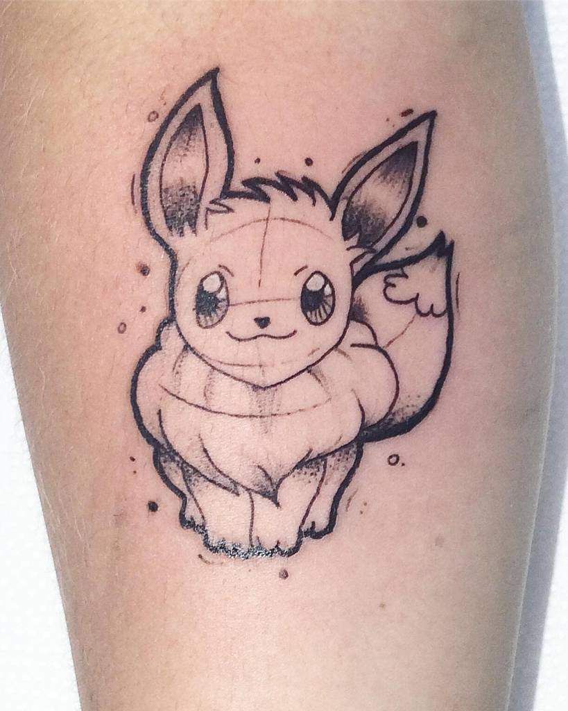 Adorable sketch-style Eevee tattoo featuring light shading and whimsical details, evoking a playful and artistic vibe