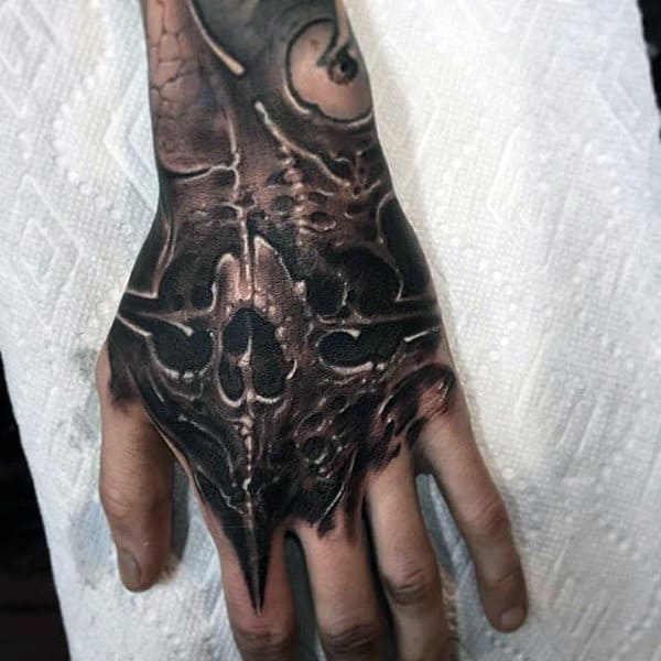 Skull Hand Insane Guys Tattoo