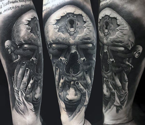 Surreal black and grey tattoo of a skull with a keyhole, crawling figures, and hands, symbolizing inner struggle, escape, and hidden truths.