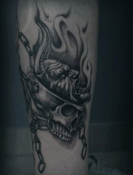 Skull Male With Chain And Cross Tattoo