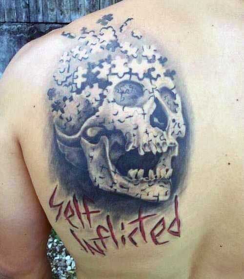 Skull Puzzle Piece Mens Back Tattoo Design