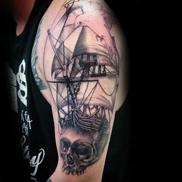 Skull Sailing Ship Nautical Upper Arm Tattoo On Gentleman