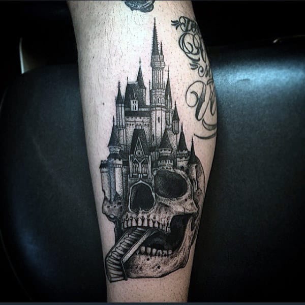 Skull Themed Castle Mens Tattoo In Black Ink On Arm