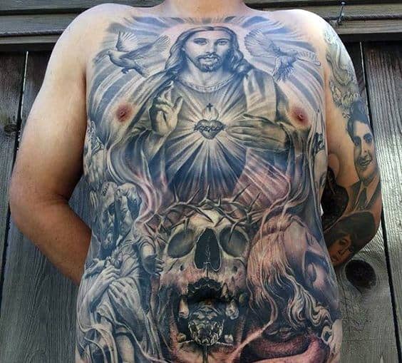 Skull With Glowing Jesus Male Tattoo Designs On Chest