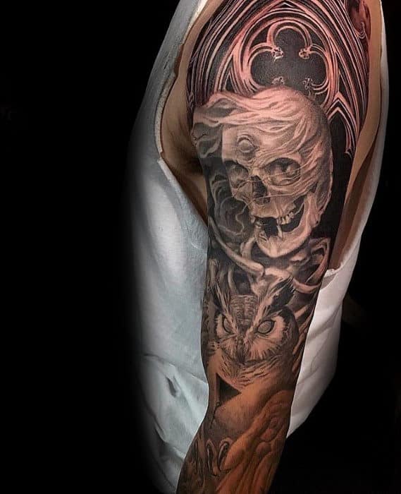 Skull With Owl And Church Window Sleeve Tattoo For Men