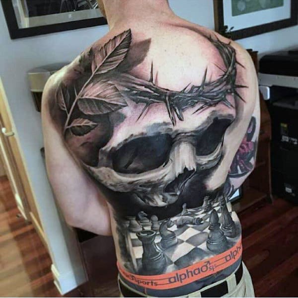 Skull With Thorns And Chess Board Modern Male Back Tattoos