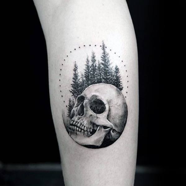 Skull With Trees And Circle Mens Small Detailed Tattoo On Leg