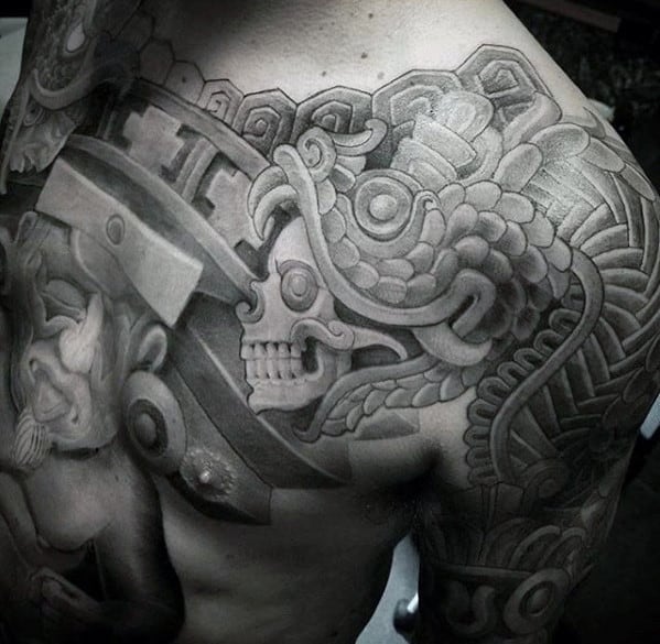 Skull With Tribal Design Guys Different Chest And Arm Tattoos